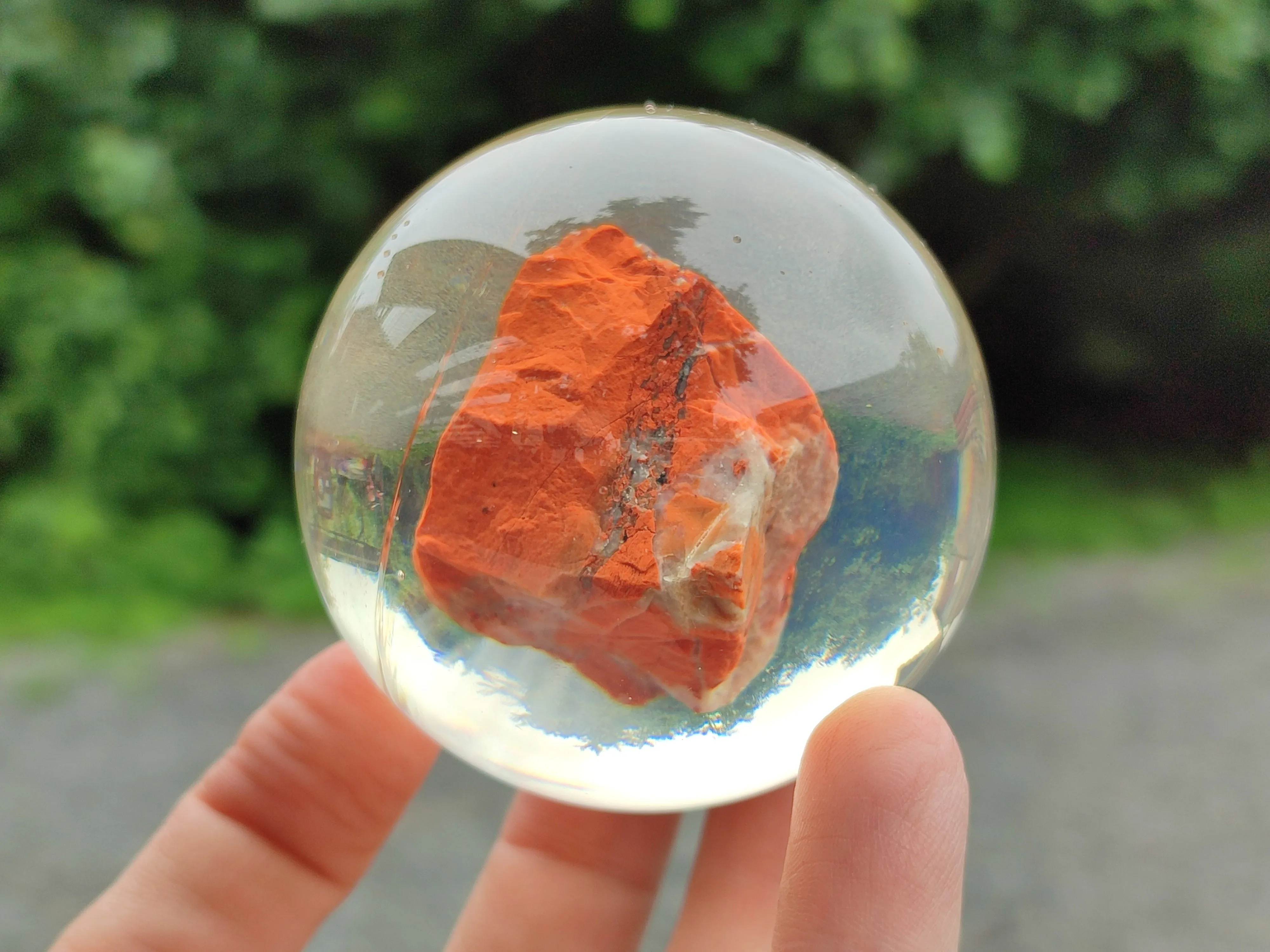 Polished  Brecciated Red Jasper cobbed piece in PVC Resin Sphere - sold per item - From Northern Cape, South Africa