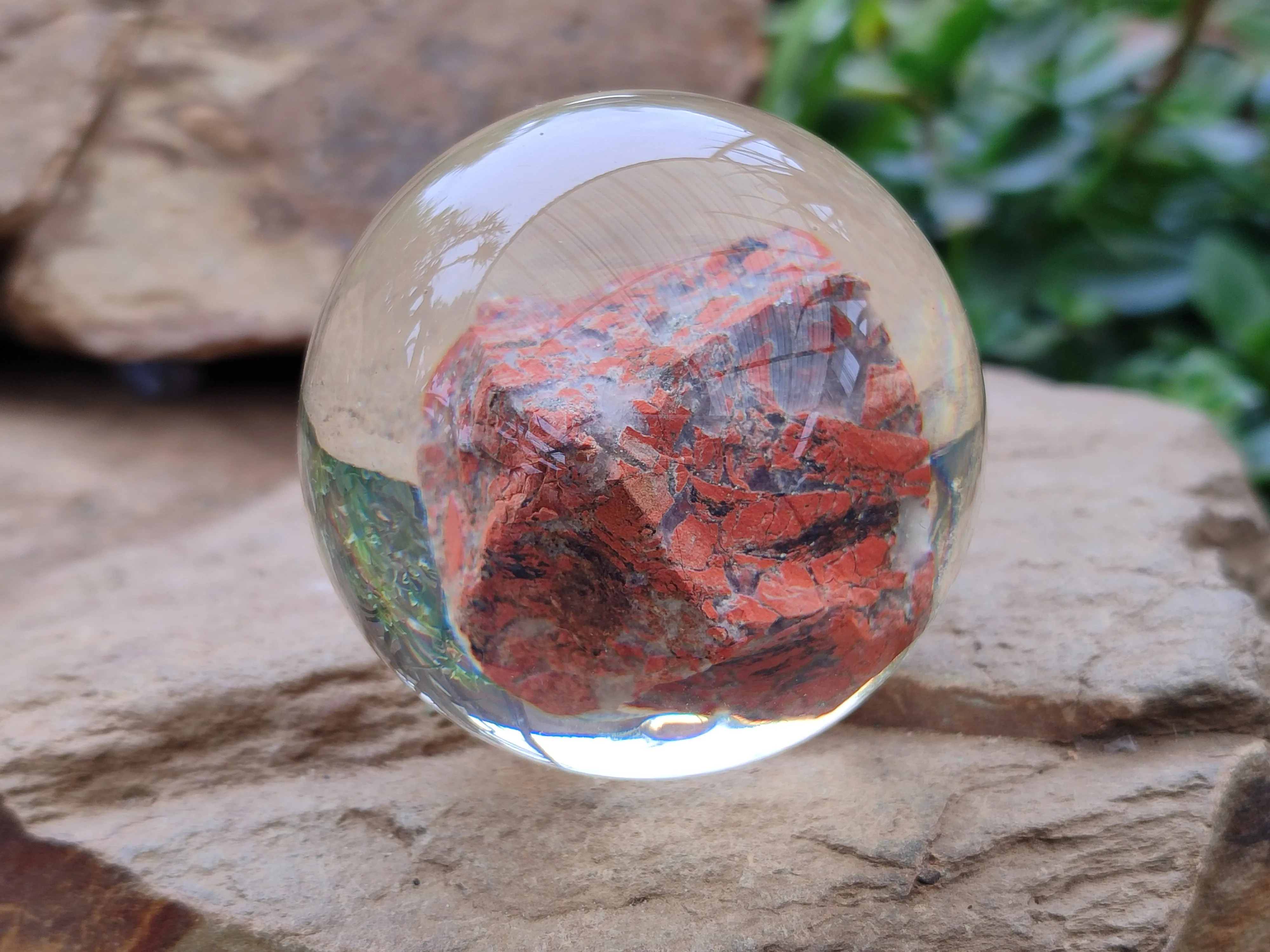 Polished  Brecciated Red Jasper cobbed piece in PVC Resin Sphere - sold per item - From Northern Cape, South Africa