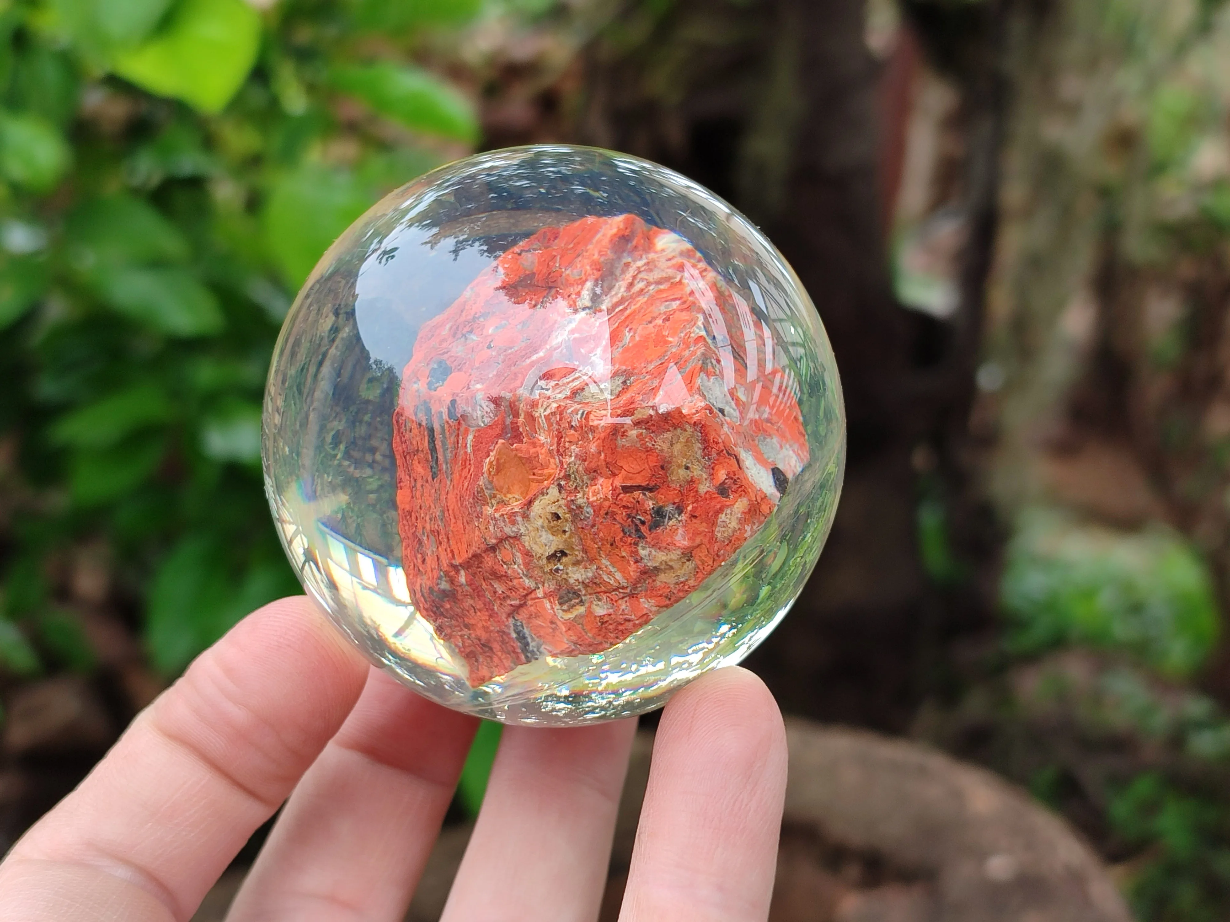 Polished  Brecciated Red Jasper cobbed piece in PVC Resin Sphere - sold per item - From Northern Cape, South Africa