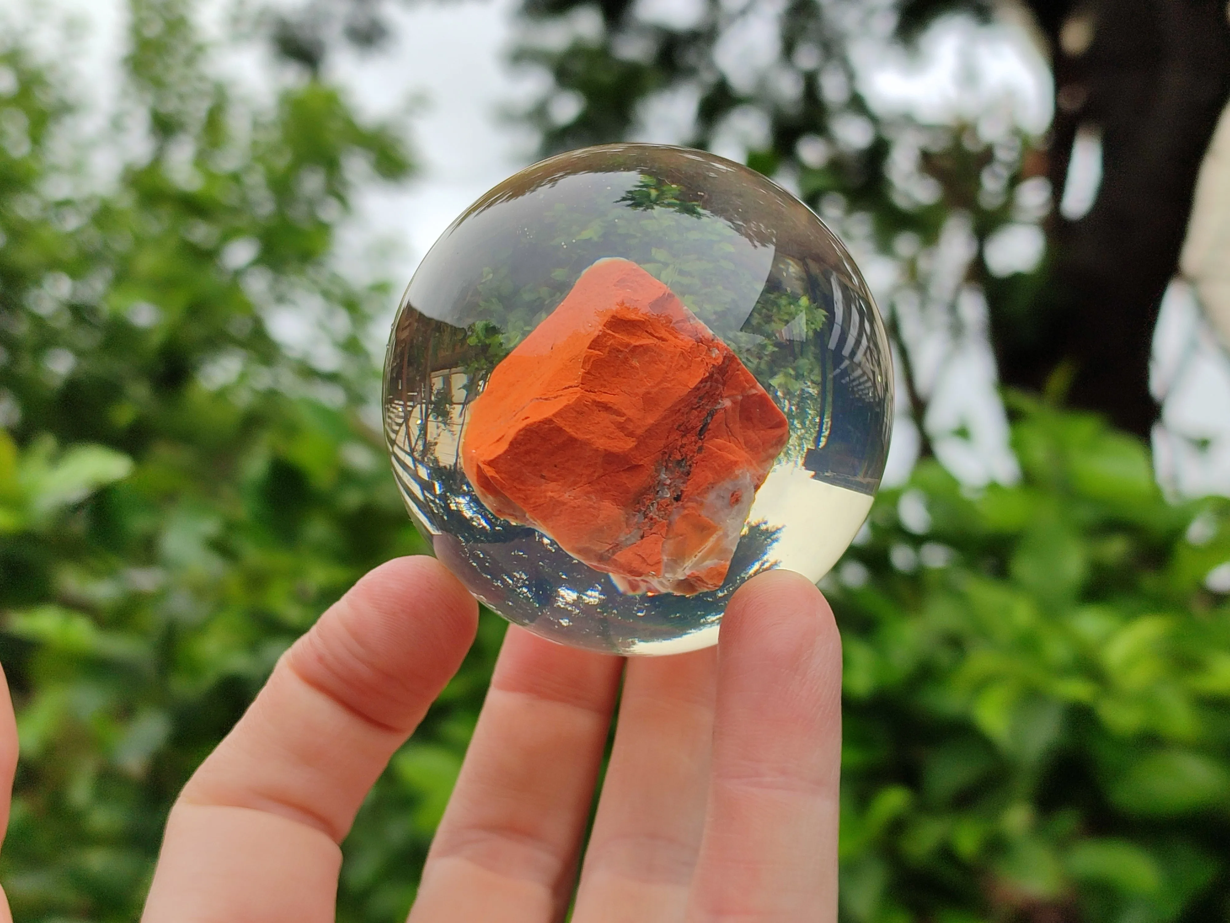 Polished  Brecciated Red Jasper cobbed piece in PVC Resin Sphere - sold per item - From Northern Cape, South Africa