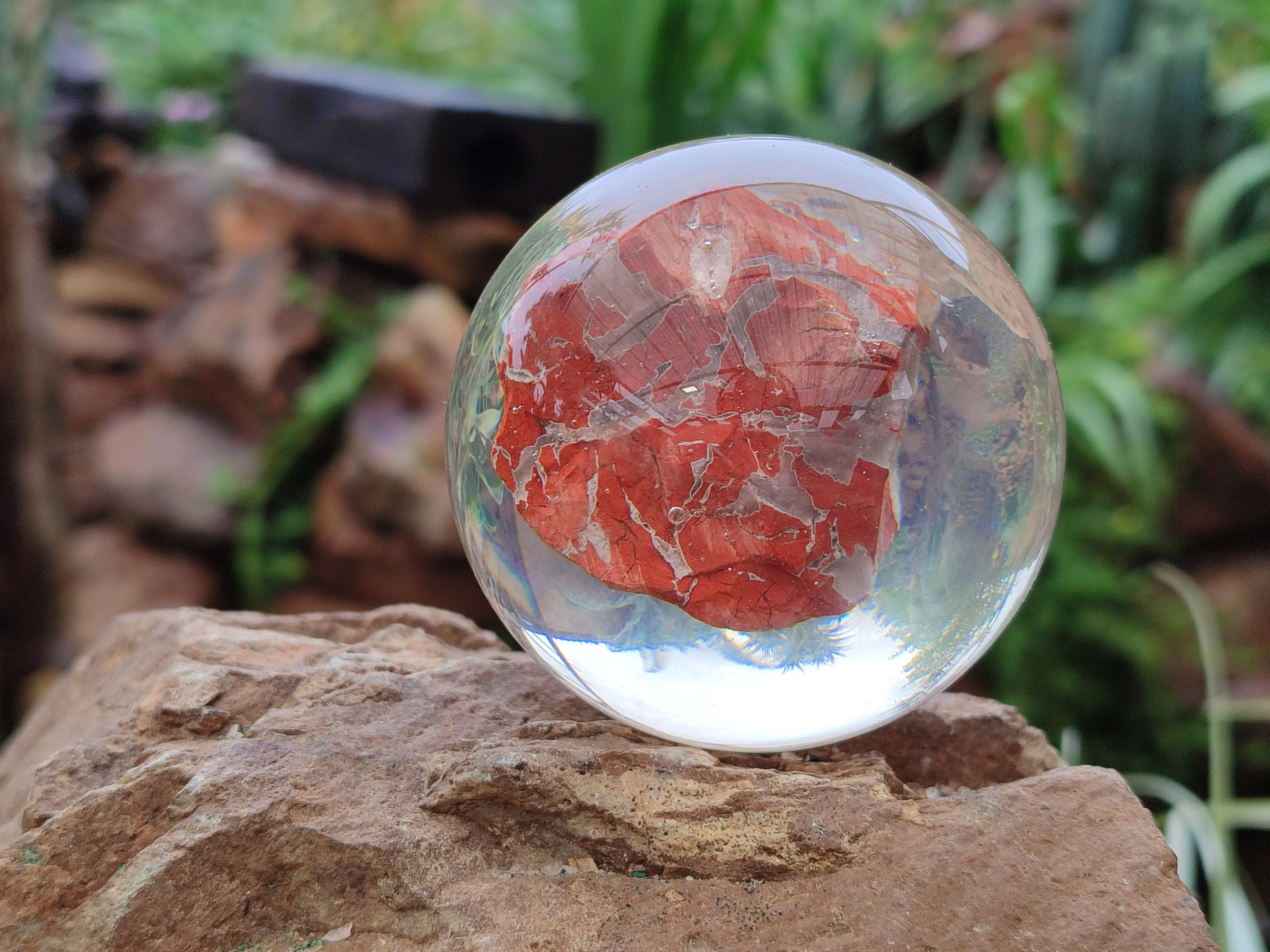 Polished  Brecciated Red Jasper cobbed piece in PVC Resin Sphere - sold per item - From Northern Cape, South Africa