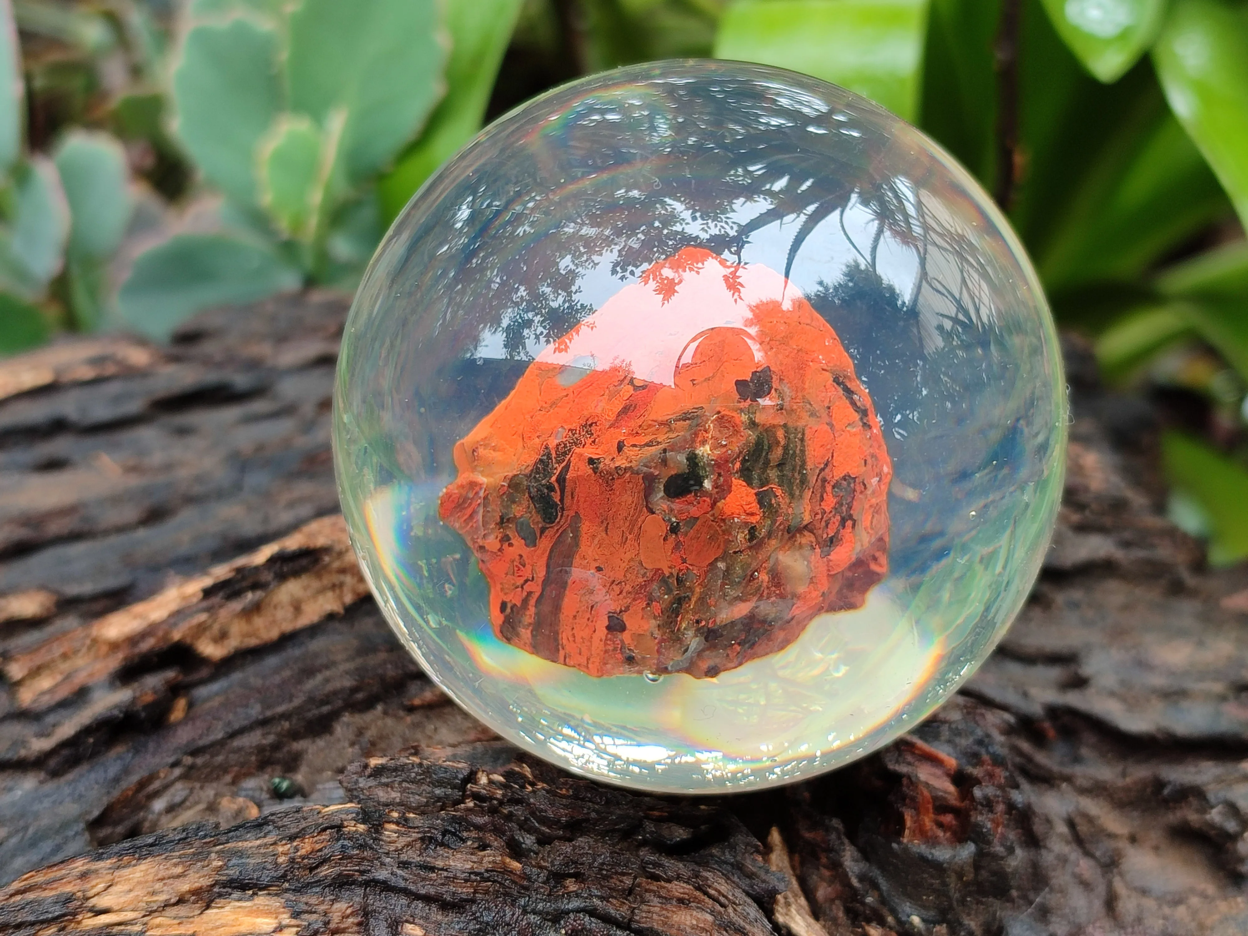 Polished  Brecciated Red Jasper cobbed piece in PVC Resin Sphere - sold per item - From Northern Cape, South Africa