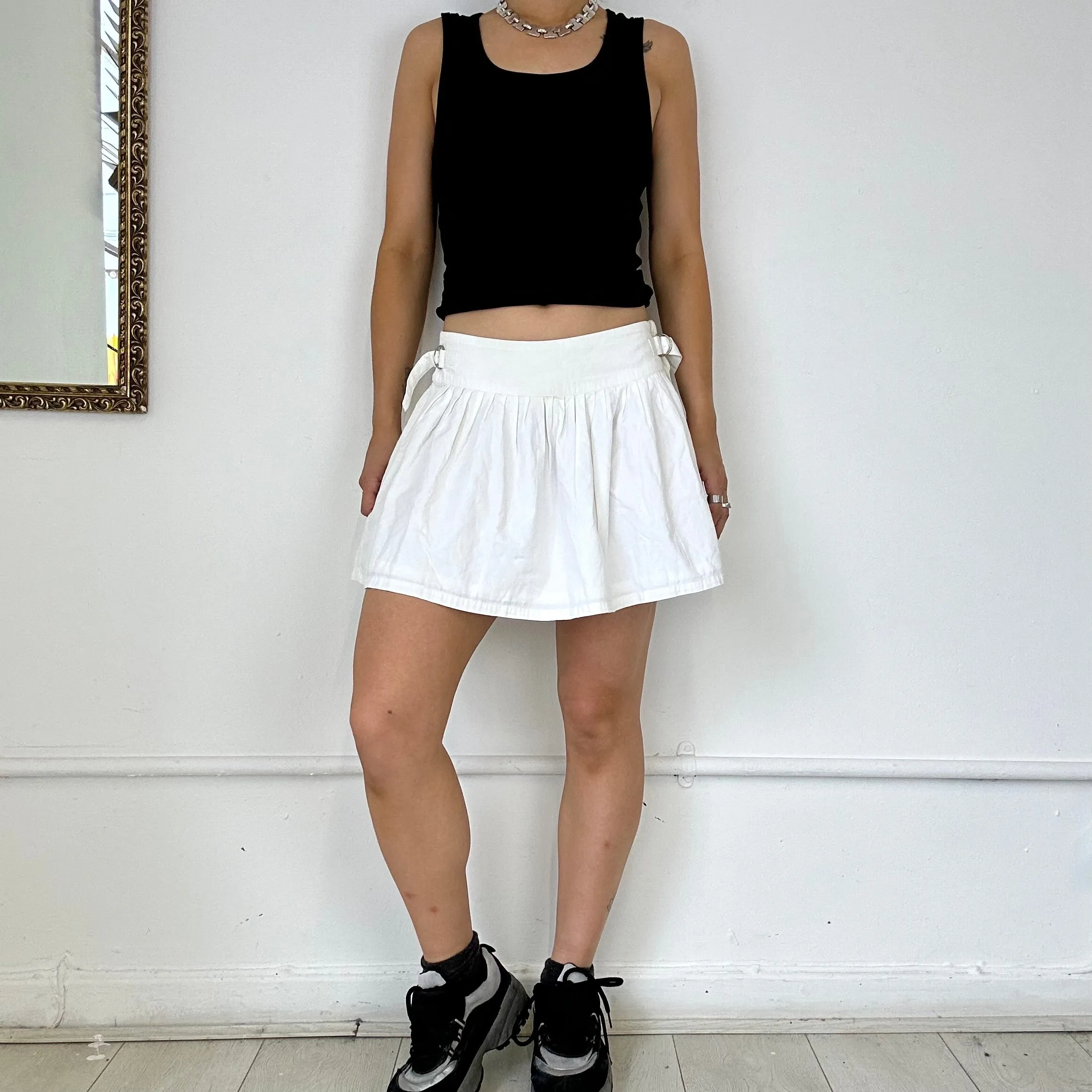 white mini pleated skirt